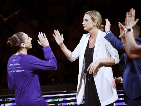 Phoenix Mercury guard Diana Taurasi (left) high-fives Penny Taylor, director of player development/performance, before playing against the Dallas Wings at Talking Stick Resort Arena in Phoenix, Ariz. May 14, 2017.