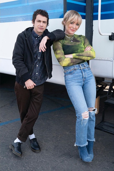 Jake Thomas and Hilary Duff posing for a photo in their 'Lizzie McGuire' outfits.