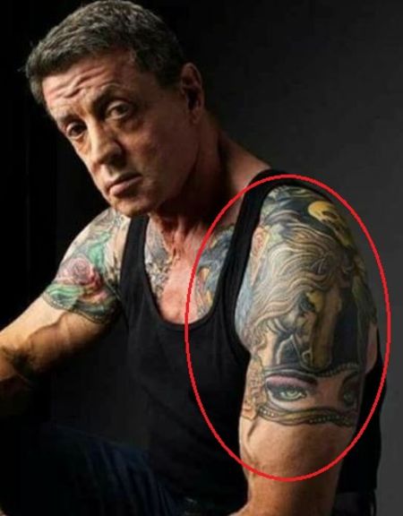 Sylvester Stallone's Left Arm Tattoo.