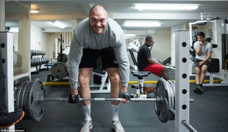 Tyson Fury lifting weight