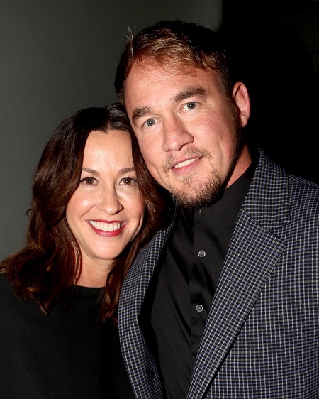 Alanis Morissette and husband Mario “Souleye” Treadway pose at the opening night of the new Alanis Morissette musical "Jagged Little Pill" on Broadway at The Broadhurst Theatre on December 5, 2019 in New York City.