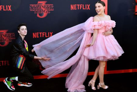 Noah Schnapp accompanying Millie Brown at the red carpet event