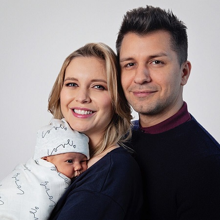 Rachel Riley and her husband Pasha Kovalev with their new-born daughter.