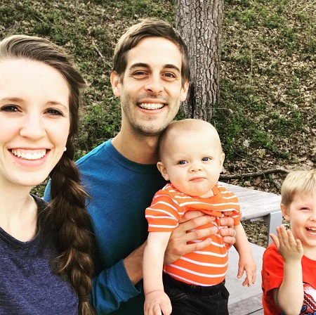 Jill Duggar and husband Derick Dillard with their two kids.