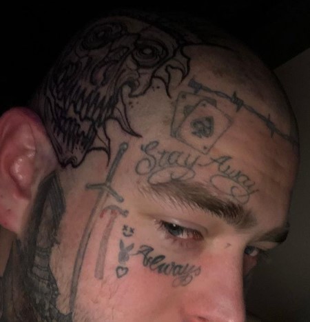 post malone new skull tattoo on his head.