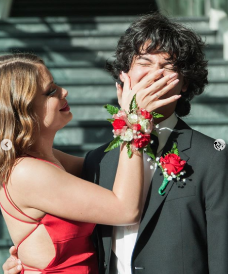 Xolo Maridueña being shut by possibly ex-girlfriend Hannah Kepple in prom dresses.