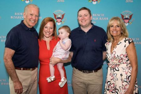 Gregory Mercher and Jen Psaki with President Joe Biden and Jill Biden.