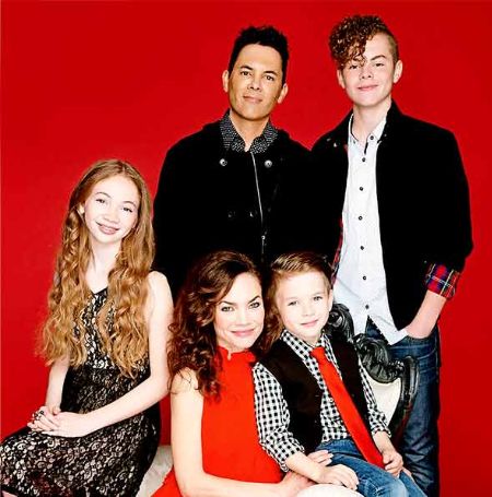 Rebecca Herbst's with her husband Michael Saucedo and three childrens.