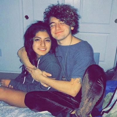 JC Caylen and Chelsey Mario Amaro pose a picture together.