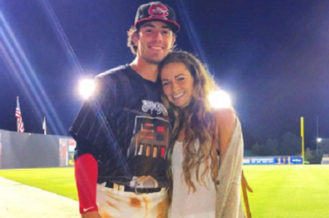 Dansby Swanson and his girlfriend Kara Sheft pose a picture.
