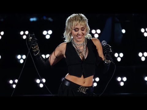 Miley Cyrus performing at NCCA