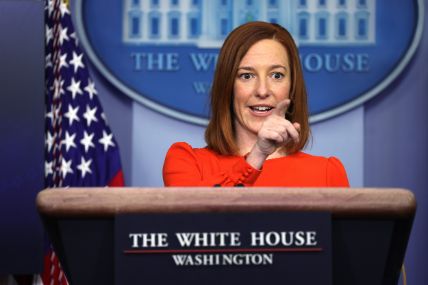 Jen Psaki answering questions at a press conference. 