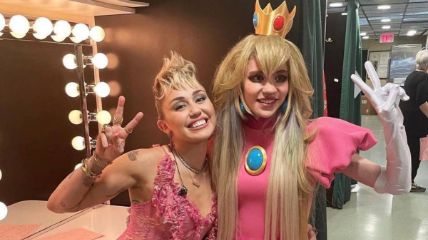 Grimes as Princess Peach along with singer Miley Cyrus.