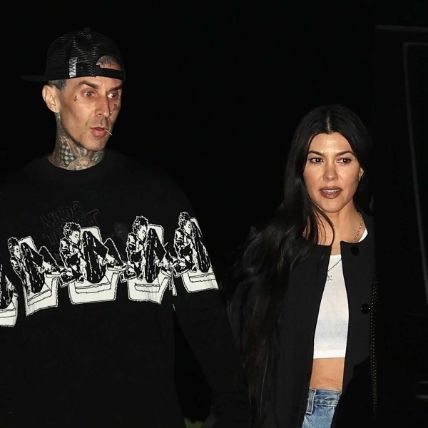 Kourtney Kardashian and Travis Barker clicked as they head for a date.