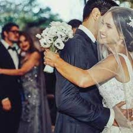 Adria Arjona dancing at her wedding with husband Edgardo Canales.