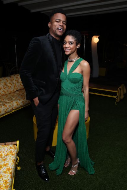 Tiffany Boone posing with Marque Richard during Golden Globe award ceremony.