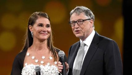 Melinda Gates with her ex-husband Bill Gates on stage.