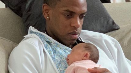 Khris Middleton with his new-born daughter in 2019.