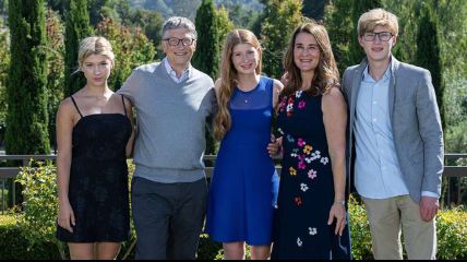 Bill Gates and his wife with their kids.