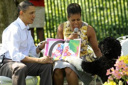 Bo having a day with Barack Obama and Michelle.