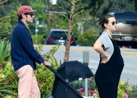 Adam Brody on a walk with his family.