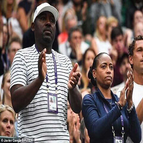 Coco Gauff's parents cheering her during her match