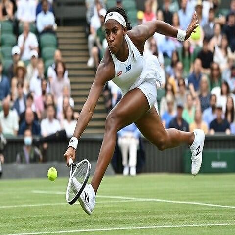Coco Gauff trying to hit the ball back to her opponent