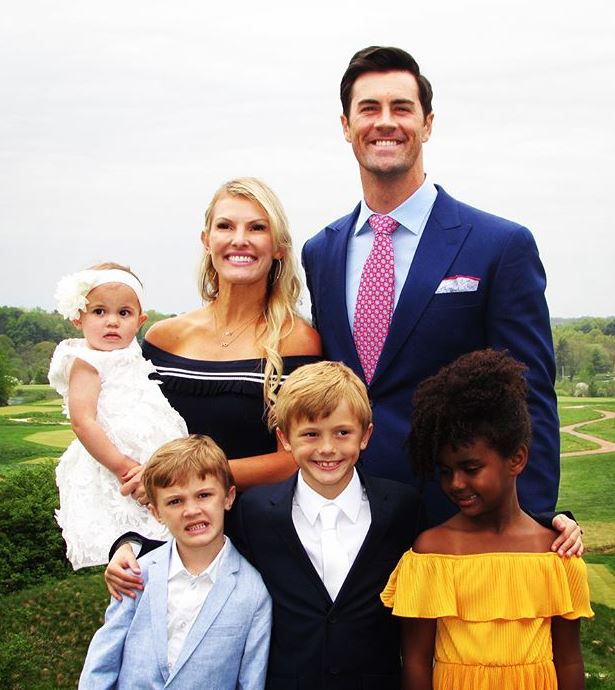 Cole Hamels and his wife together with his four children.