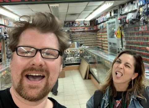 Justin Roiland at the gaming store with his friend