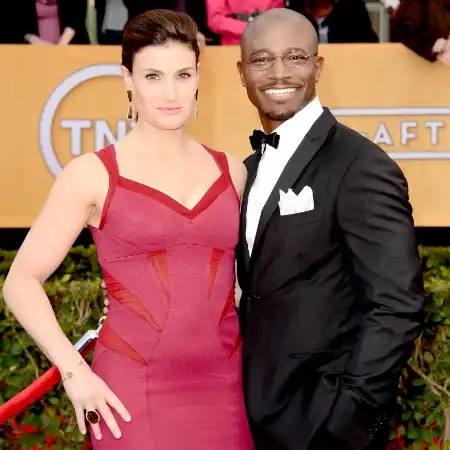 Taye Diggs and Idina Menzel are in the picture.