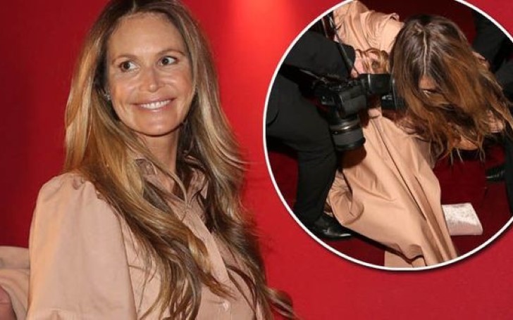Elle Macpherson Left Red-Faced as She Falls Off a Stage in Vienna