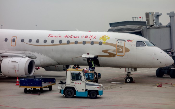 Passenger Gets Arrested For Throwing Six Coins At Plane Engine For Good Luck