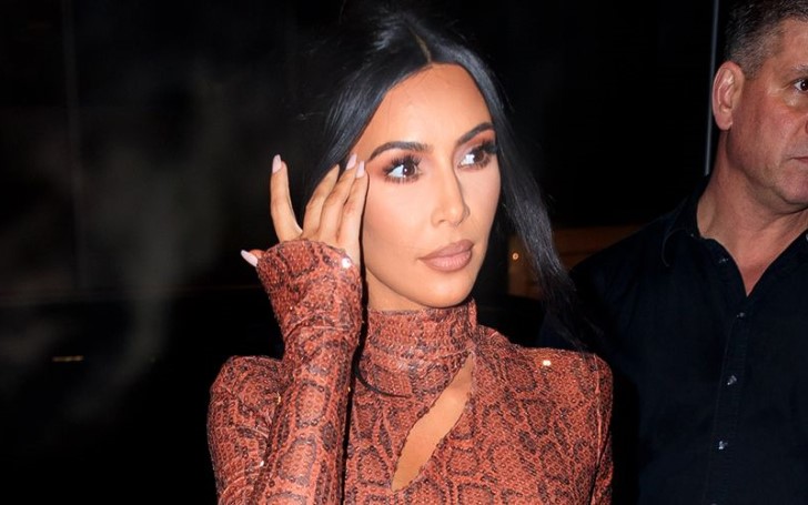 Kim Kardashian Stepped Out in a Seductive Skin-Tight Snakeskin Dress