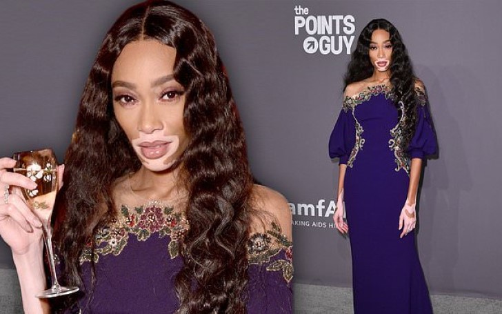 Winnie Harlow Looks Stunning in Purple and Gold at the 21st Annual amfAR Gala
