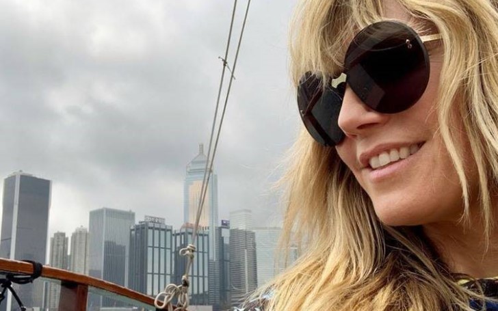 Heidi Klum Isn't Afraid To Show a Little Skin as She Poses Topless in Steamy Photos From Hong Kong Trip