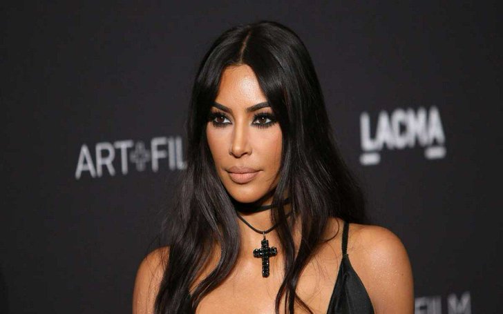 Kim Kardashian West Says Newborn Is 'Most Calm And Chill' Of All Her Kids